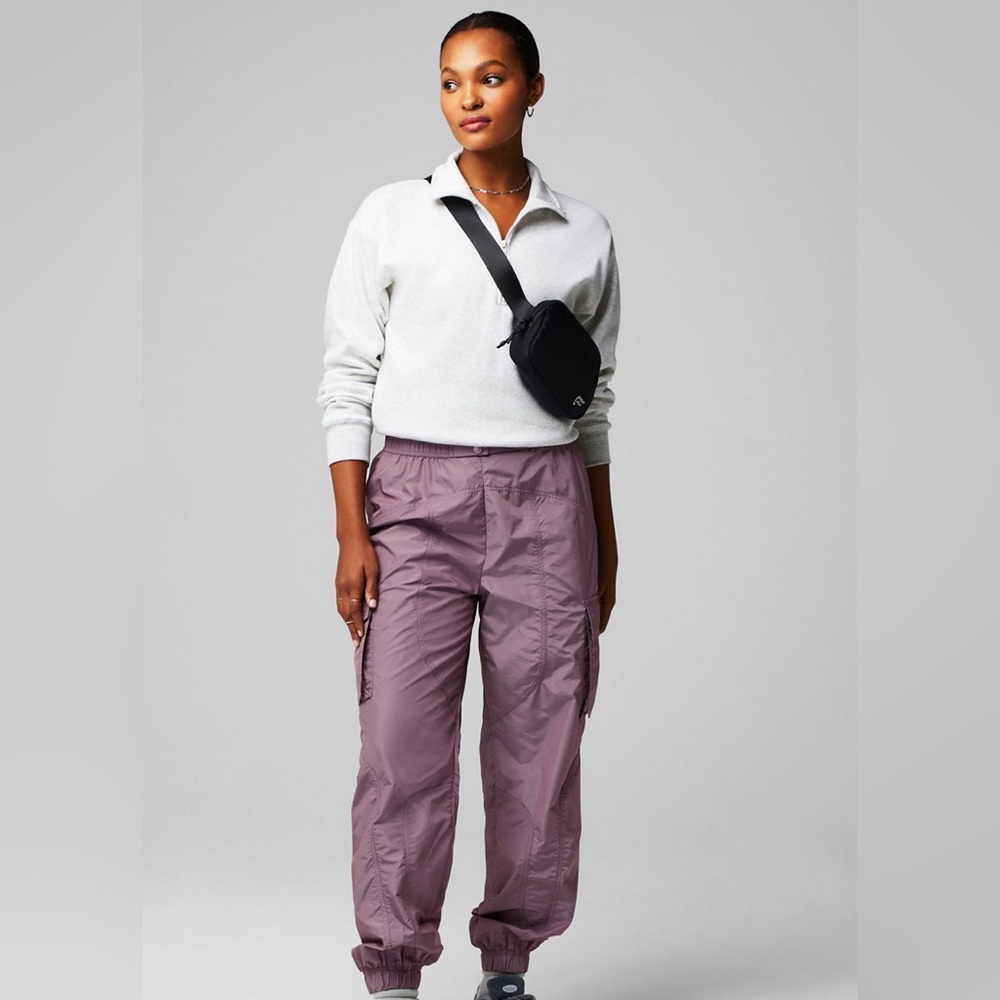 Fabletics Parachute Pant Size S
Lightweight Cargo Jogger
Windbreaker Plum Shine
